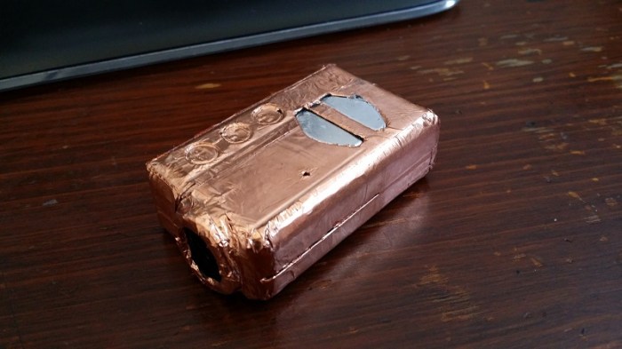 Covered up, save for openings for the heatsink and LED.