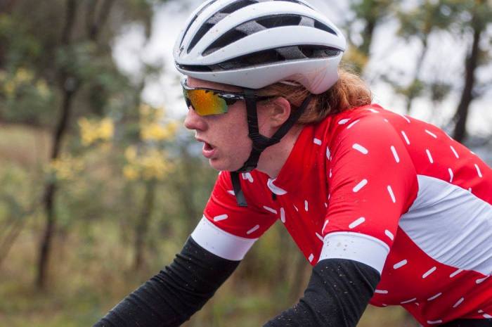 Claire heading up the Strade Nero dirt climb. Photo: Cycling Victoria facebook